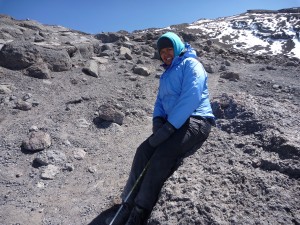 Sitting on a boulder, not permitted to go any further. At peace with the CEO's decision